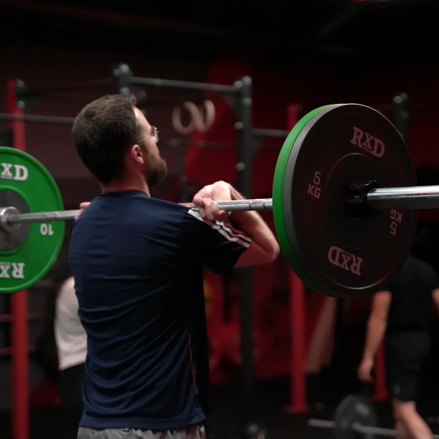 Frontrack-Position mit olympischer Langhantel im Weightlifting Kurs im Iron Gym Viersen